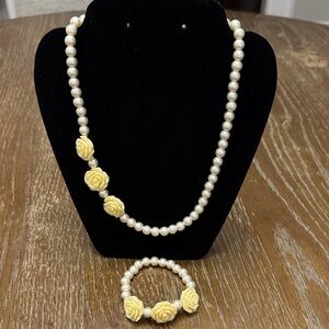 Lucite rose and faux pearl jewelry set- a necklace and a matching bracelet. EUC